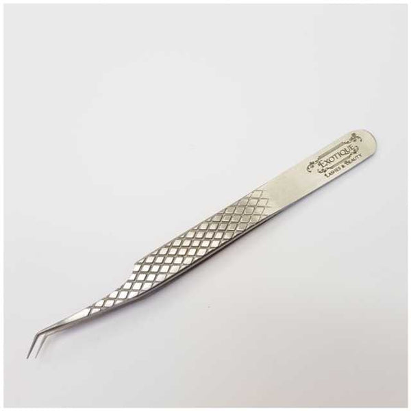 Tweezer with an angled tip